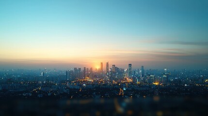 Naklejka premium City skyline at night with bright orange sky and illuminated buildings under twilight atmosphere