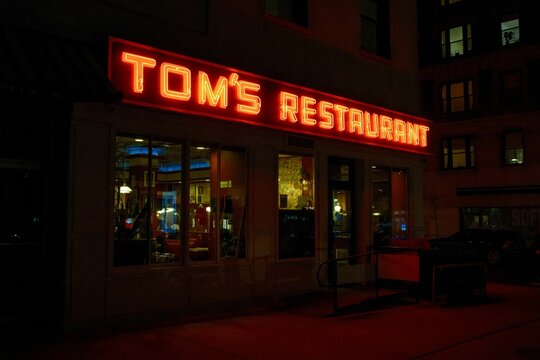 Toms Restaurant vintage neon sign at night in Morningside Heights, Manhattan, New York City