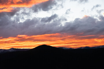 Orange Skies at Sunset Over The Rocky Mountains