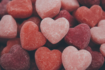 Fototapeta premium A bunch of pink hearts made of candy