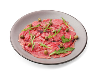 Fresh beef carpaccio with arugula, capers and sauce isolated on white