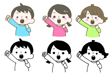 こぶしを上げて意気込む子ども