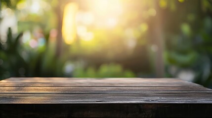 Empty Wooden Table Outdoors In Sunlight With Blurred Background
