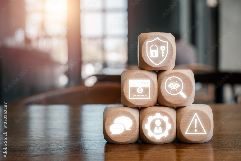 Poster wooden blocks with digital security icons representing social engineering concepts in a modern offic