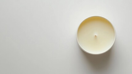 White candle, top view, minimalist background, relaxation