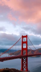 Fototapeta premium panorama bridge sunset san francisco golden sky gate light california cloudy gold gate bridge frisco travel landscape us red sky bay sea 101 view icon blue coast cloud cable ocean symbol coastal
