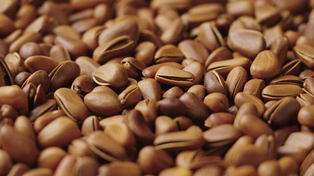 close up of roasted pine nuts background 