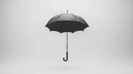 Black umbrella, studio shot, plain background, rainy day protection