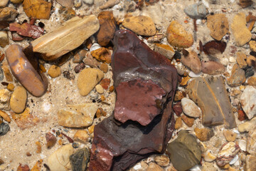Natural beach rocks at the tropical sea
