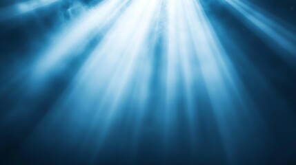 Sunlight Rays Shining Through Dark Blue Atmospheric Water Abstract Background