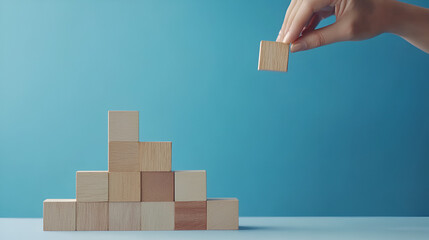 Hand arranging block on blue background Business concept on progress or building something ai genrative