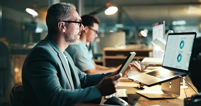 Fist pump, winner and businessman on tablet at night for online bonus, stock market success and fintech. Corporate, office and happy person celebrate on laptop for investment, profit and promotion