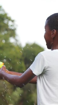 Group of kids playing with water gun