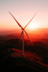 Wind turbine at sunset on mountains, generating renewable energy, ecology use