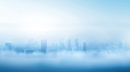 Obraz premium A serene city skyline shrouded in mist, with soft blue tones creating a tranquil atmosphere.