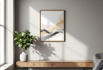 A photo frame displaying abstract art on a clean ash-colored wall with a vase and balanced lighting for warmth