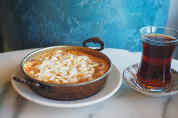 Turkish Menemen omelet in a frying pan. .