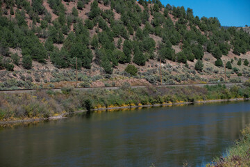 river cutting through rural Colorado