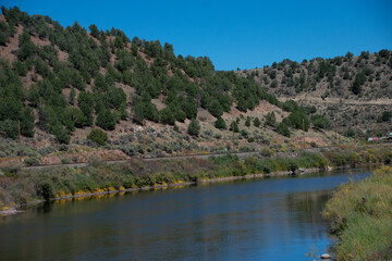 river cutting through rural Colorado