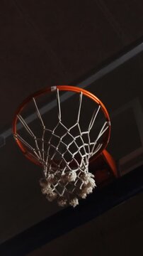 Basketball player missing a hoop