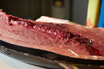 Fresh tuna sashimi on a cutting board