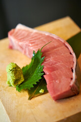 Fresh tuna sashimi on a cutting board