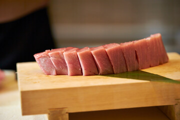 Fresh tuna sashimi on a cutting board