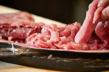 Fresh tuna sashimi on a cutting board