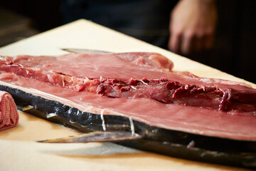Fresh tuna sashimi on a cutting board