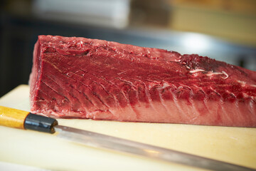 Fresh tuna sashimi on a cutting board