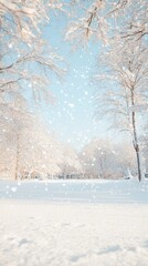 Fototapeta premium Serene winter wonderland with snow-covered trees and falling snowflakes