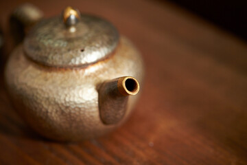 Silver teapot close-up, traditional tea	