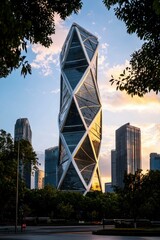 Fototapeta premium Unique architecture. Modern tower stands tall in urban jungle, bathed in sunset glow