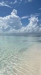 Serene ocean scene with crystal-clear waters and white sandy beaches, showcasing the beauty of nature's landscapes. Blue sky with fluffy clouds adds to the picturesque appearance