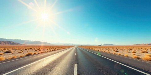 Naklejka premium A sun-drenched highway stretches endlessly across a barren, sun-baked landscape under a brilliant blue sky