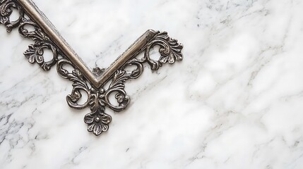 Ornate silver frame corner on marble background