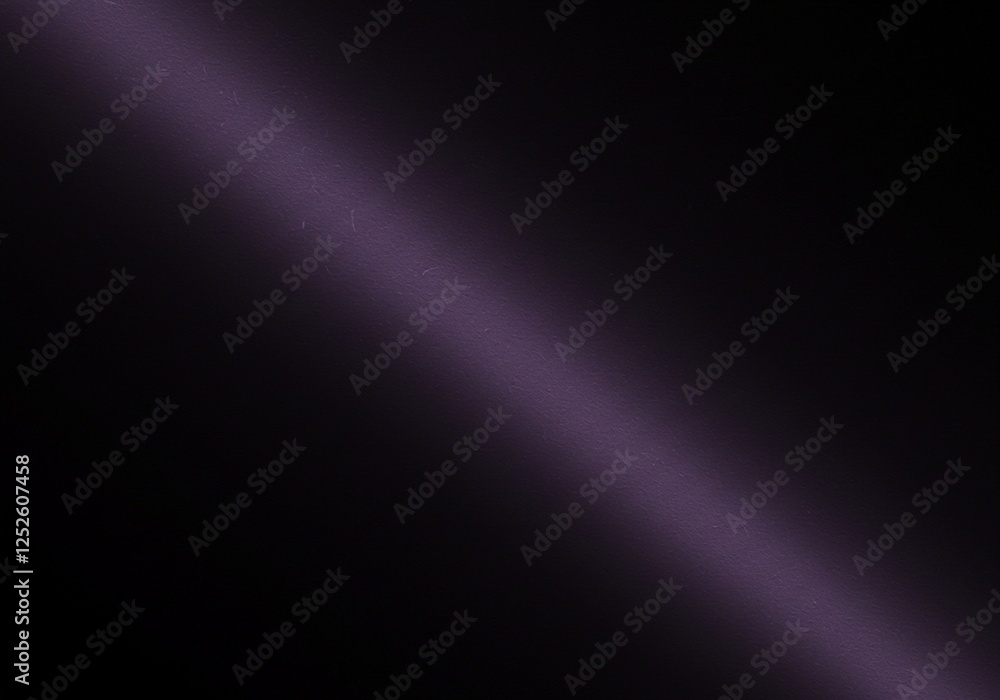 Poster this image showcases a diagonal beam of purple light illuminating a dark space, emphasizing a specif