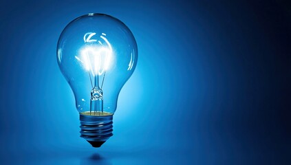 Illuminating Ideas: Glowing Light Bulb, Brilliant Innovation, Energy Efficiency, Bright Future, Glass Design,  Electric Power