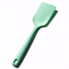 A mint green silicone spatula kitchen utensil