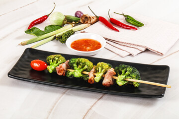 Thai Street foof satay with bacon and broccoli
