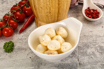 Mozzarella balls cheese in the bowl