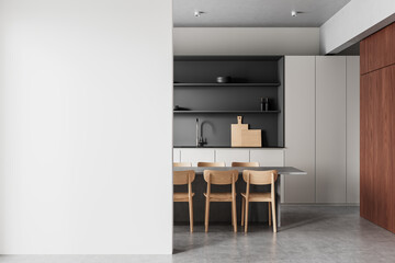 Modern kitchen interior with wooden chairs and minimalist cabinetry. 3D Rendering