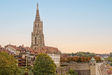Fototapeta premium Bern, capital of Switzerland. Cityscape panorama view of the Bernese Minster church and the Old City of Bern. UNESCO World Heritage Site. Copy space, place your own text and design.