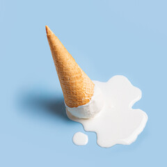 White ice cream melting and spilling