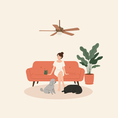 Woman Relaxing on Sofa with Dogs and Ceiling Fan