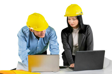 Engineers Collaborating on a Project with Laptops and Safety Helmets