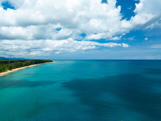 Aerial view Beautiful sea in summer season,Aerial flying drone view Waves water surface texture on sunny tropical ocean in Phuket island Thailand