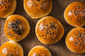 Fresh sesame burger buns. View from above. Close-up.