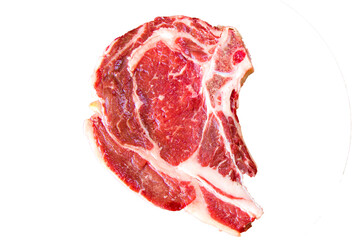 Raw beef meat on the table, spices and Rosemary, Rib eye steak ingredients. Pepper and coars salt.
