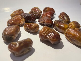some delicious dried dates isolated on white background. Arabic food